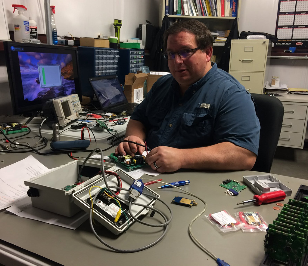 technician assembling a test fixture